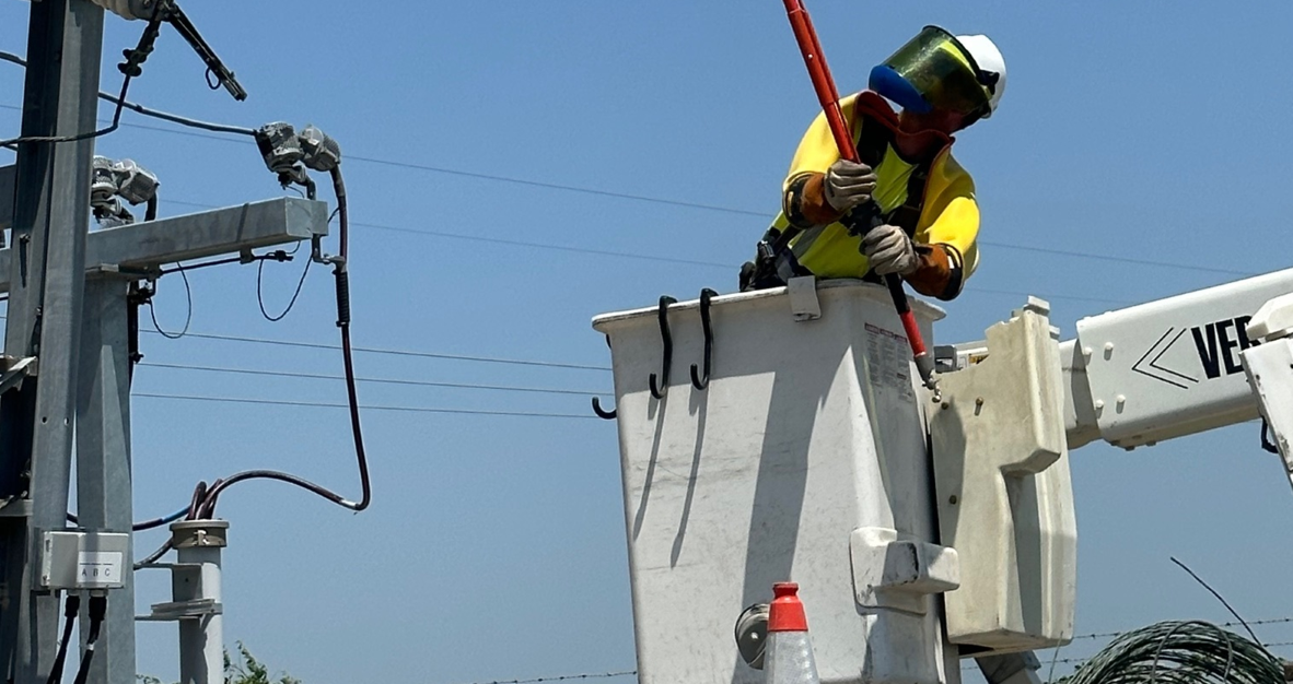 Lineman in bucket truck